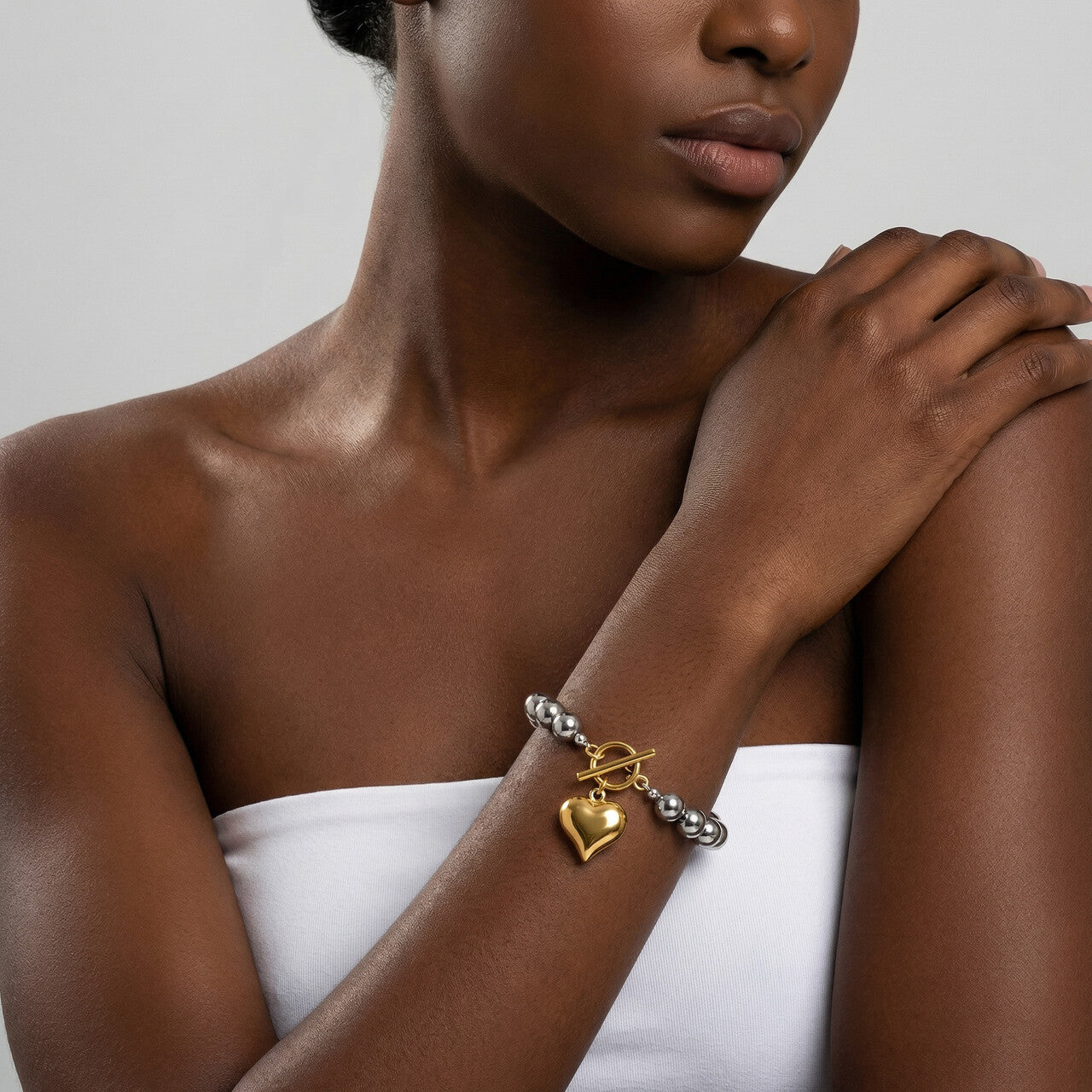 Silver Bead Bracelet with Gold Heart Charm